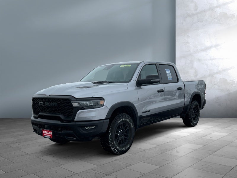 2025 RAM 1500 Rebel in Billet Silver Metallic Clearcoat — front three-quarter view