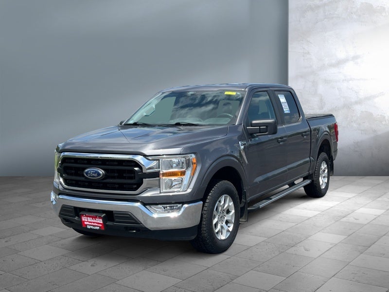 2021 Ford F-150 XLT in Stone Gray Metallic — front three-quarter view