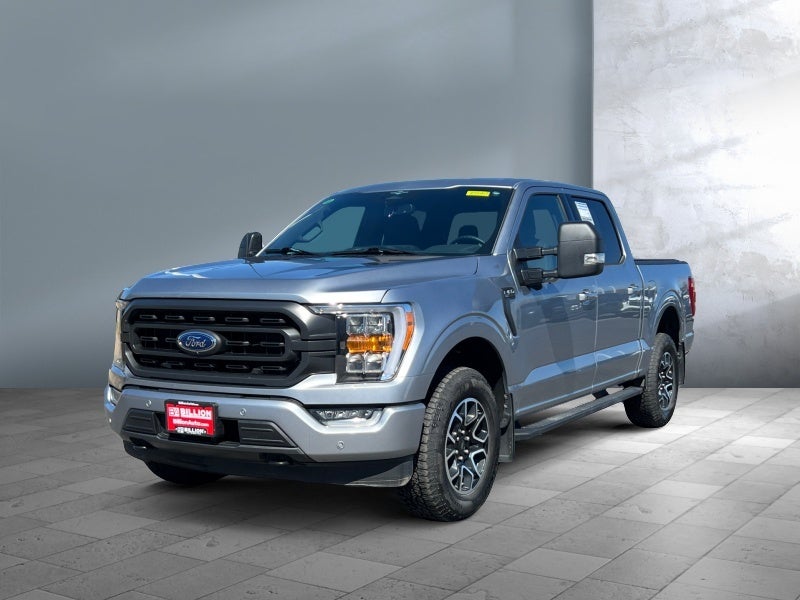 2023 Ford F-150 XLT in Iconic Silver Metallic — front three-quarter view