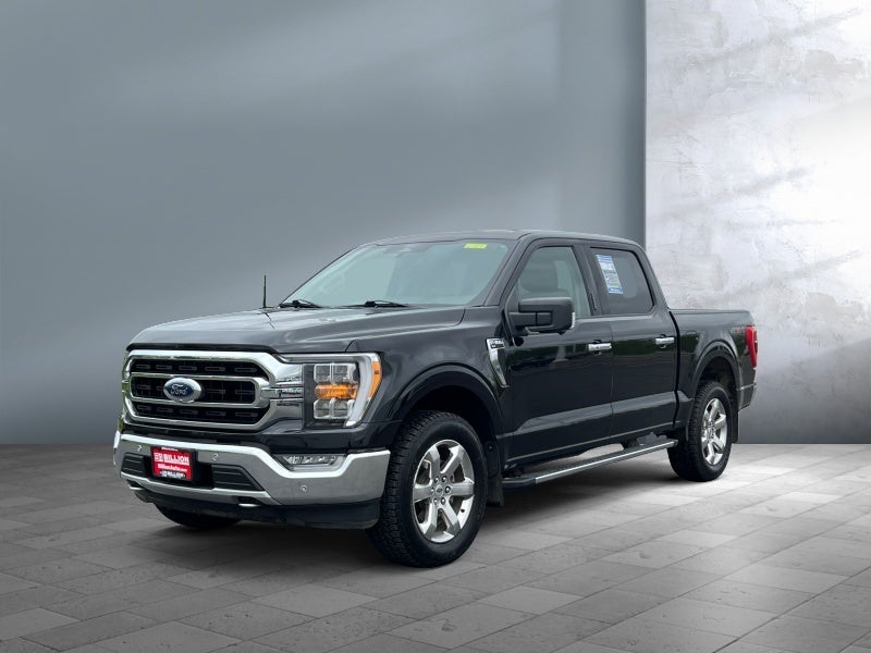 2021 Ford F-150 XLT in Agate Black Metallic — front three-quarter view
