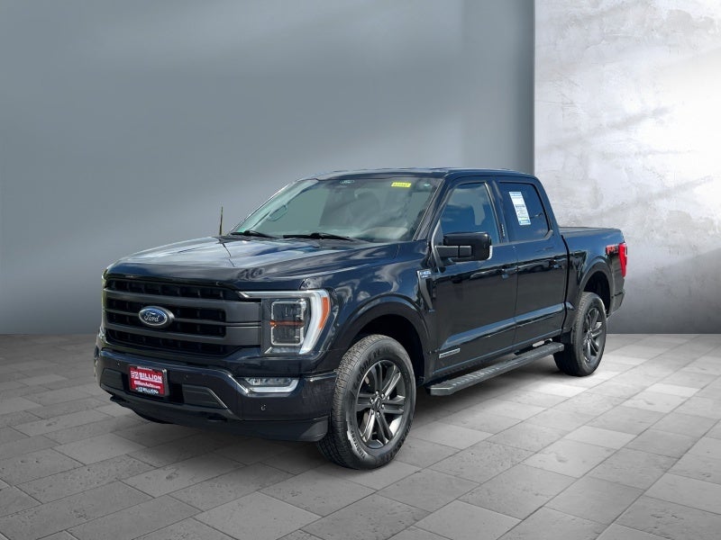 2022 Ford F-150 LARIAT in Agate Black Metallic — front three-quarter view