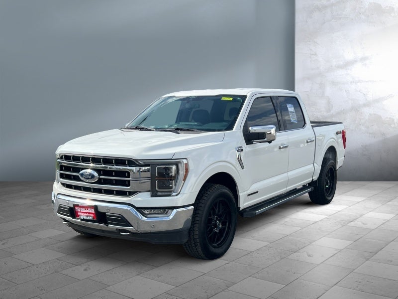 2021 Ford F-150 LARIAT in Star White Metallic Tri-Coat — front three-quarter view