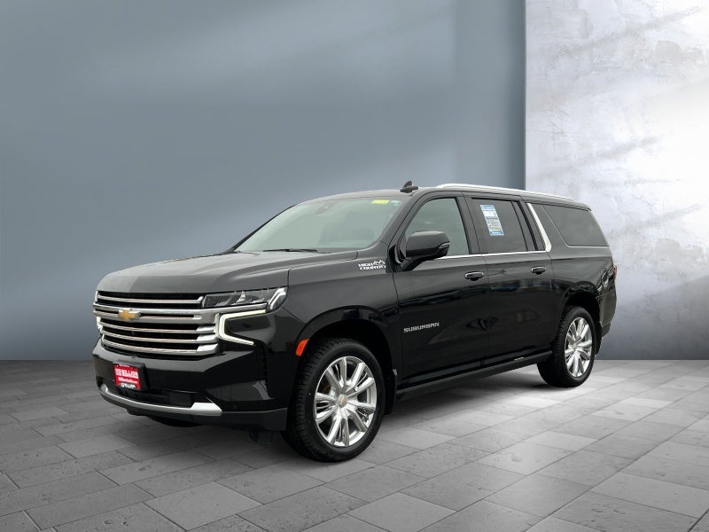 2021 Chevrolet Suburban High Country in Black — front three-quarter view