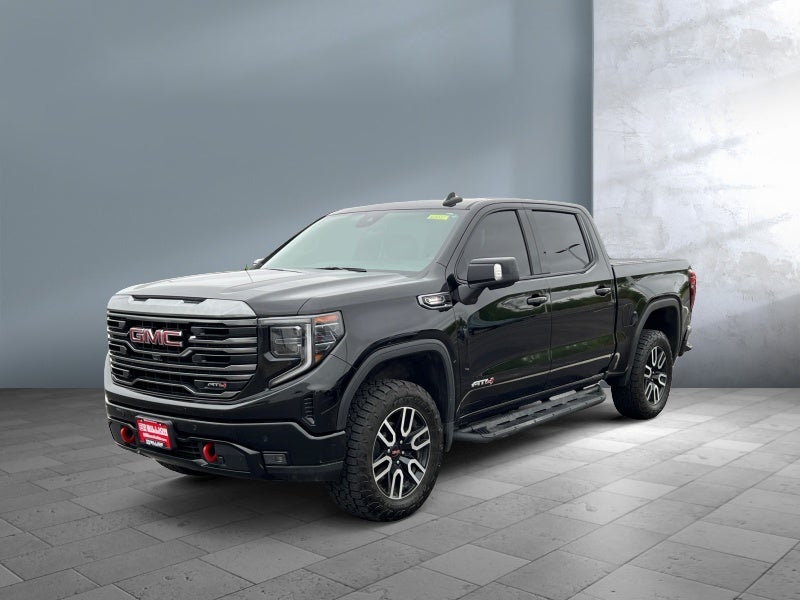 2024 GMC Sierra 1500 AT4 in Onyx Black — front three-quarter view