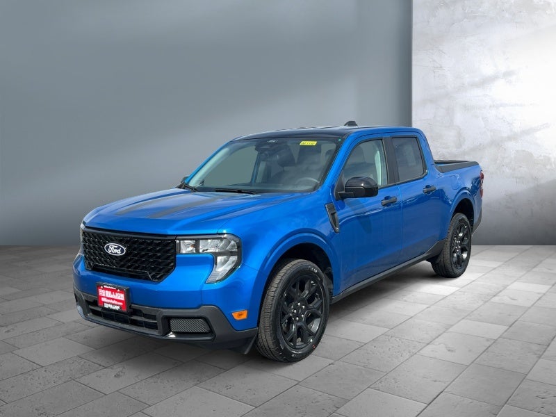 2026 Ford Maverick XLT in Velocity Blue — front three-quarter view