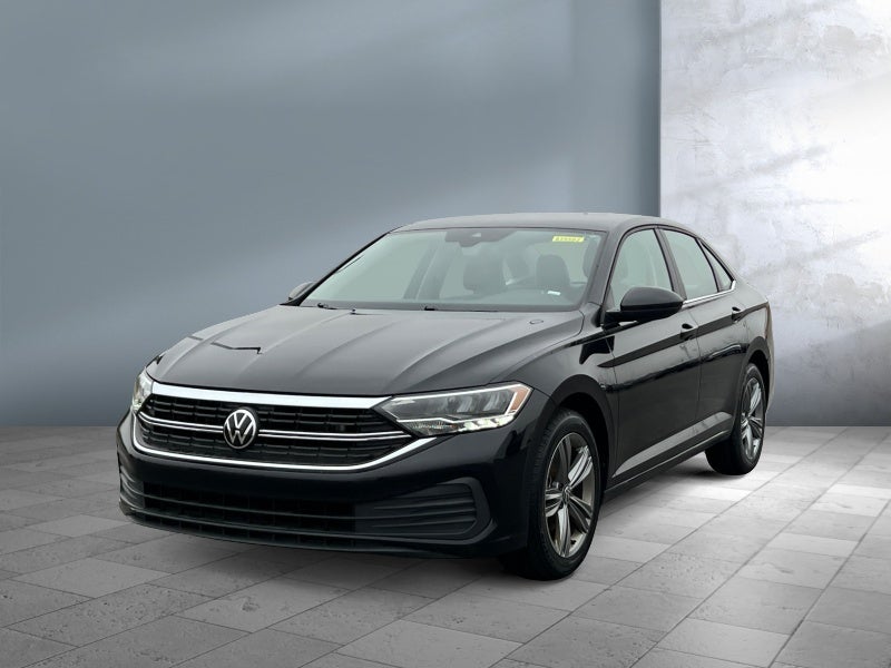 2024 Volkswagen Jetta SE in Deep Black Pearl — front three-quarter view